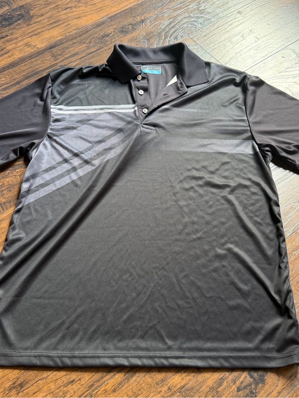 PGA TOUR Men's Black Polo Shirt with Subtle Gray Stripe Accents